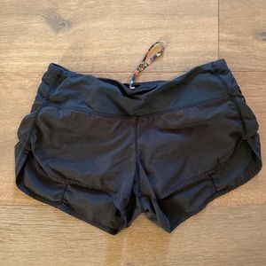 Black Lululemon running shorts with built in liner